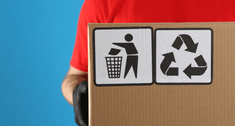 Person holding package with recycling and waste symbols - concept for Packaging EPR