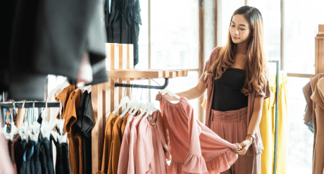 Woman shopping for clothes - concept for textiles regulations